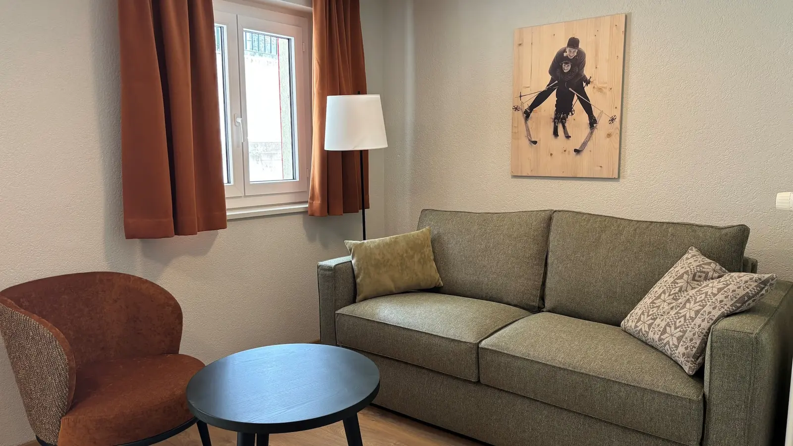 Living room with sofa and reading corner