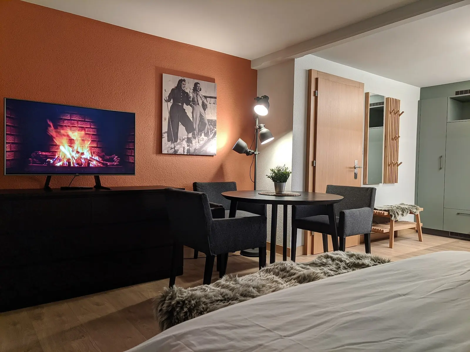 Open living space with dining area and TV