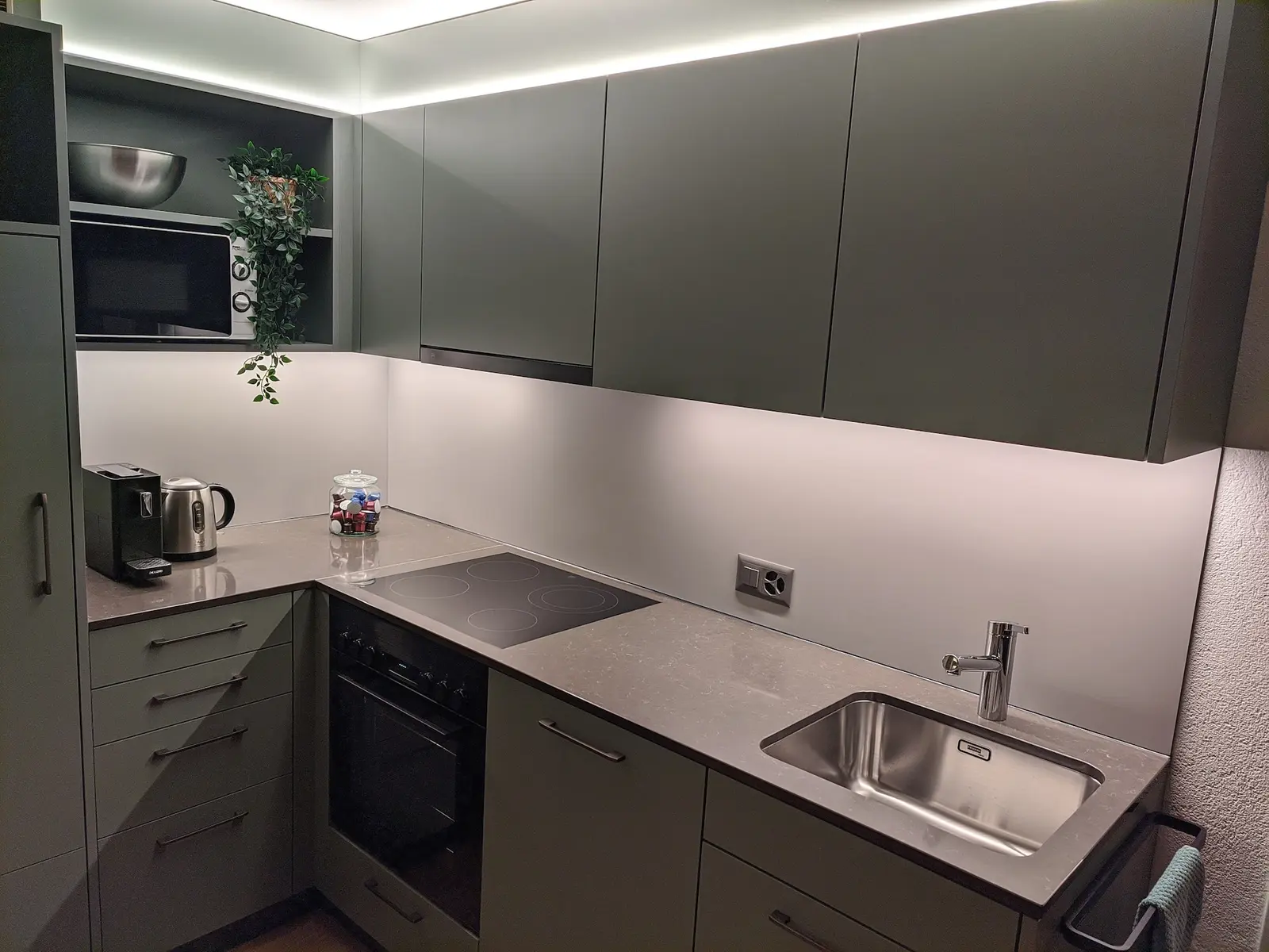 Modern kitchen with cooktop and oven