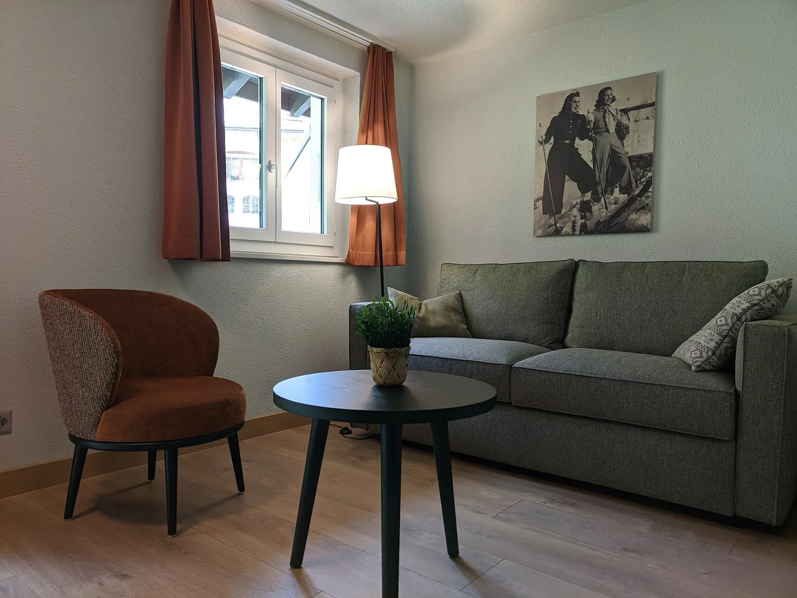 Living room with sofa and reading corner