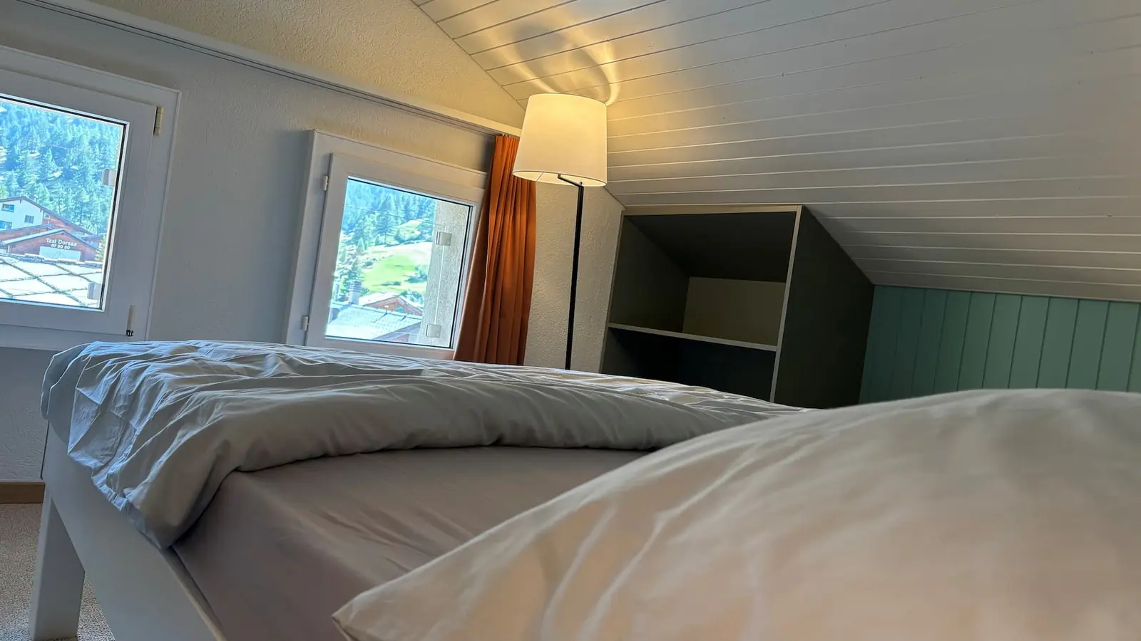 Attic bedroom by the window